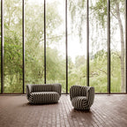 Fauteuil de salon contemporain en tissu bouclé avec cadre enveloppant curviligne pour le salon