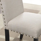 Table à manger de style moderne avec table de bar ronde et 2 chaises de bar cloutées