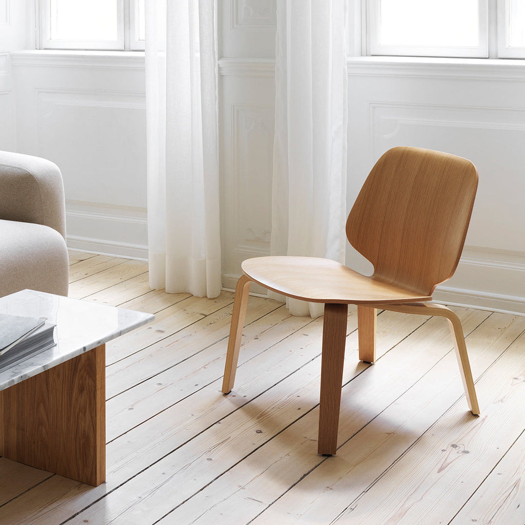 Fauteuil de salon minimaliste en placage moulé avec un design empilable et flexible pour le salon