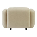 Fauteuil de salon rembourré minimaliste avec silhouette aux courbes douces pour le salon