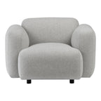 Fauteuil de salon rembourré minimaliste avec silhouette aux courbes douces pour le salon