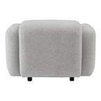 Fauteuil de salon rembourré minimaliste avec silhouette aux courbes douces pour le salon