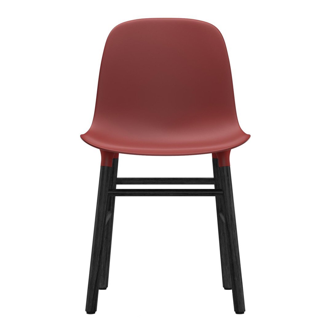 Chaise de salle à manger contemporaine en plastique moulé et chêne avec système d'assemblage intégré.