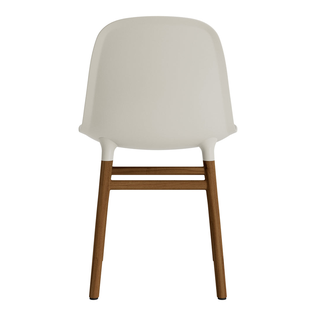 Chaise de salle à manger contemporaine en plastique moulé et chêne avec système d'assemblage intégré.
