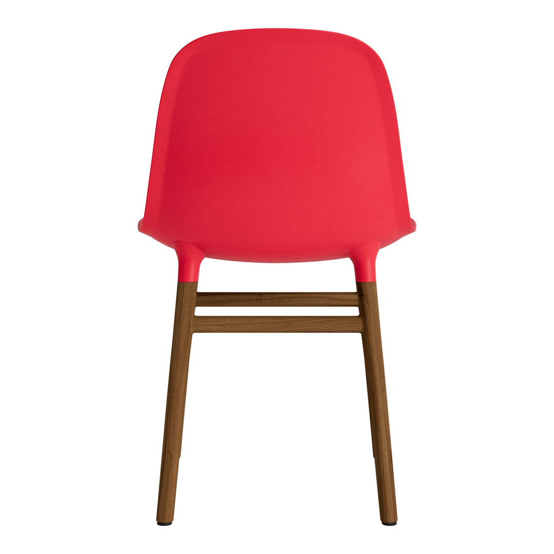 Chaise de salle à manger contemporaine en plastique moulé et chêne avec système d'assemblage intégré.