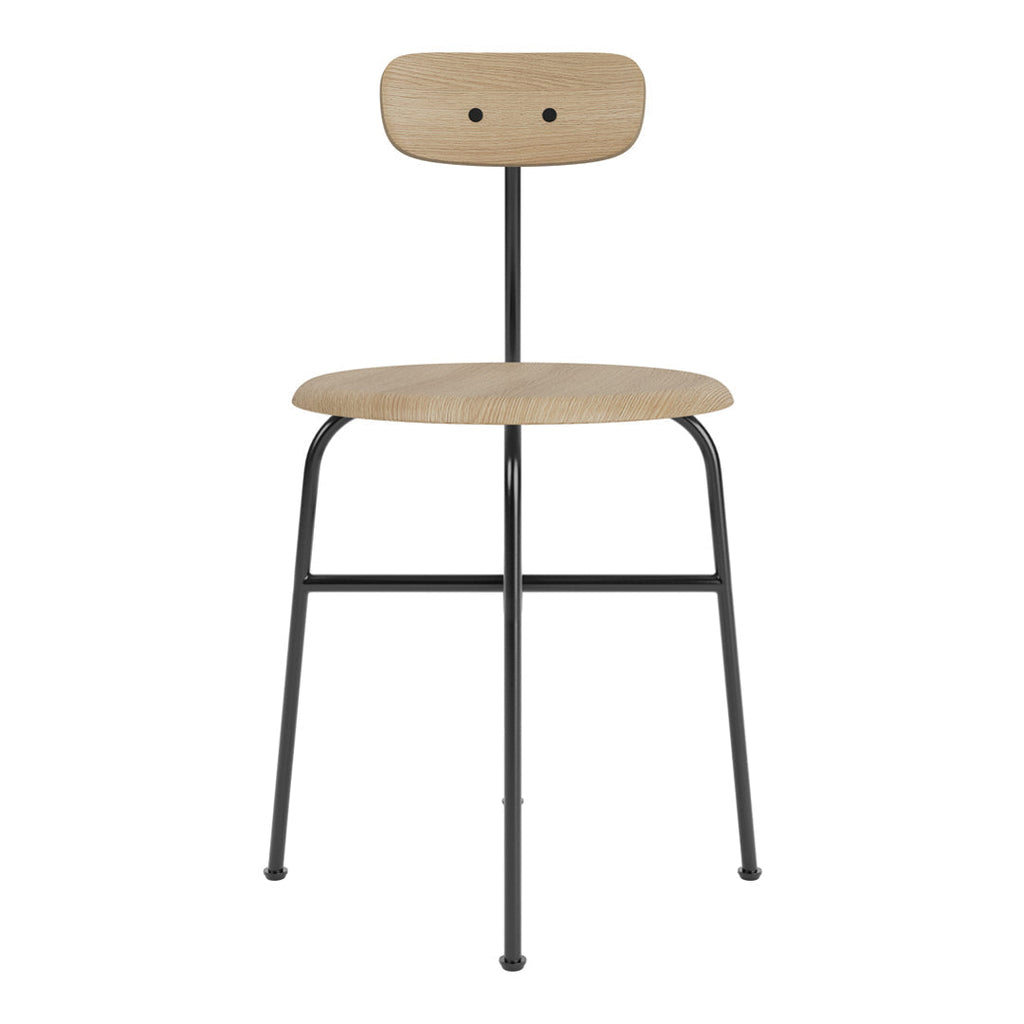 Chaise d'appoint minimaliste Bauhaus en acier et bois avec assise arrondie et dossier flexible pour salle à manger
