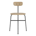 Chaise d'appoint minimaliste Bauhaus en acier et bois avec assise arrondie et dossier flexible pour salle à manger
