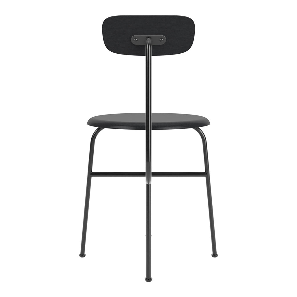 Chaise d'appoint minimaliste Bauhaus en acier et bois avec assise arrondie et dossier flexible pour salle à manger