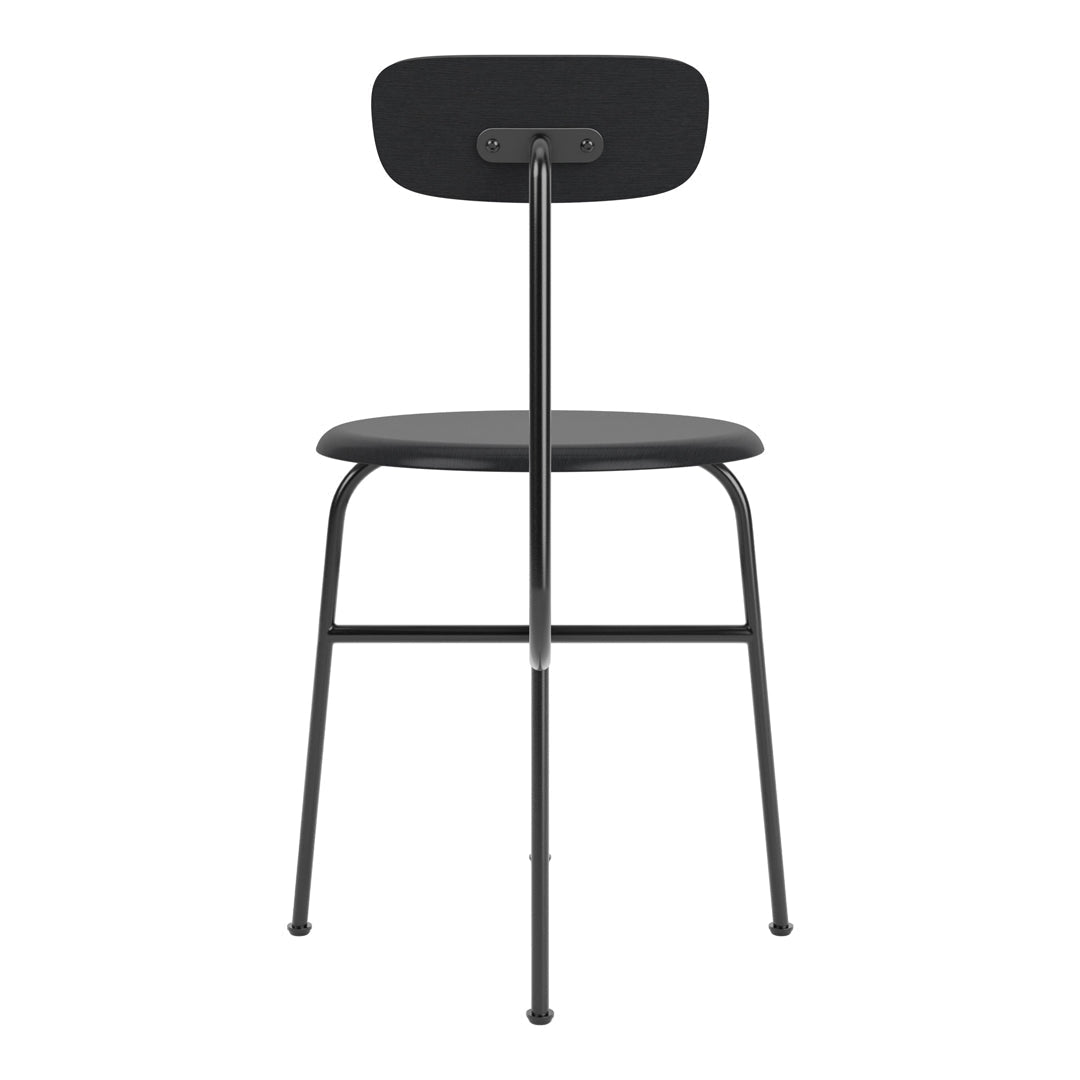 Chaise d'appoint minimaliste Bauhaus en acier et bois avec assise arrondie et dossier flexible pour salle à manger