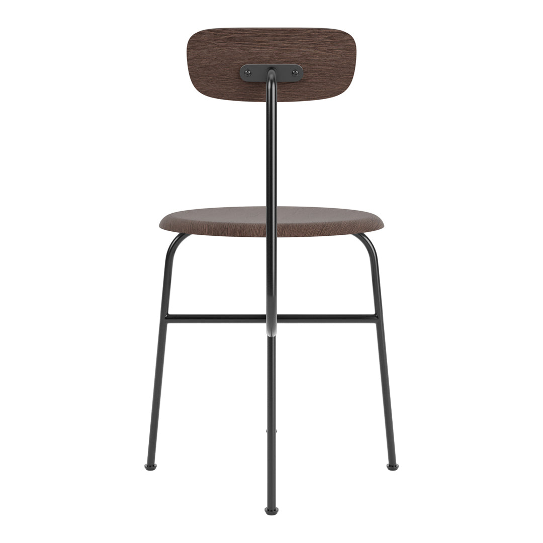 Chaise d'appoint minimaliste Bauhaus en acier et bois avec assise arrondie et dossier flexible pour salle à manger