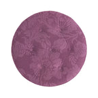 Ottoman rond d'appoint capitonné