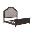Lit rembourré marron, commode avec miroir et table de chevet