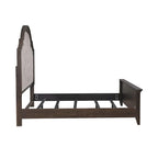 Lit rembourré marron, commode avec miroir et table de chevet
