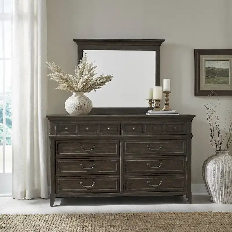 Lit rembourré marron, commode avec miroir et table de chevet