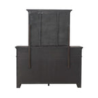 Lit rembourré marron, commode avec miroir et table de chevet