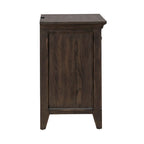Lit rembourré marron, commode avec miroir et table de chevet