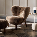 Table d'appoint contemporaine en marbre et acier avec piètement sculptural en forme de sucette inversée pour salon ou chambre à coucher