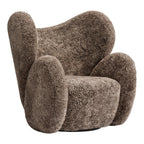 Fauteuil de salon pivotant entièrement rembourré Art Déco avec structure bloc volumineuse pour salon