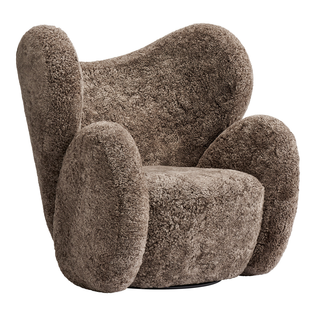 Fauteuil de salon pivotant entièrement rembourré Art Déco avec structure bloc volumineuse pour salon