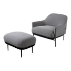 Fauteuil de salon contemporain rembourré, avec profil arrondi sculptural et cadre en métal pour le salon