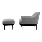 Fauteuil de salon contemporain rembourré, avec profil arrondi sculptural et cadre en métal pour le salon