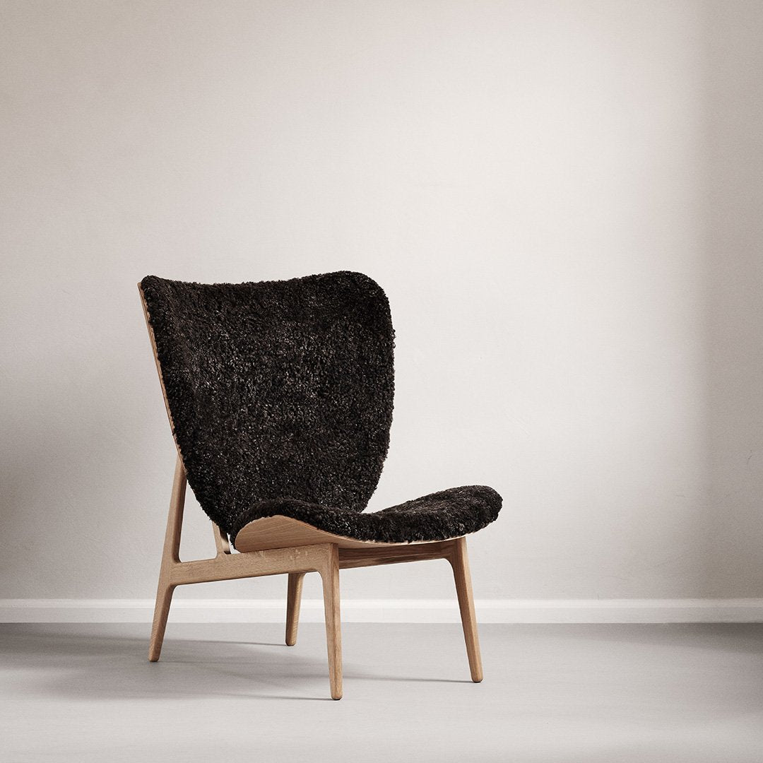 Fauteuil de salon scandinave en chêne massif avec dossier incurvé en forme d'oreille d'éléphant pour salon