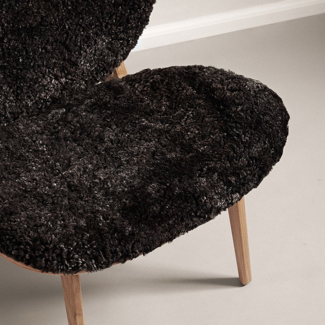 Fauteuil de salon scandinave en chêne massif avec dossier incurvé en forme d'oreille d'éléphant pour salon