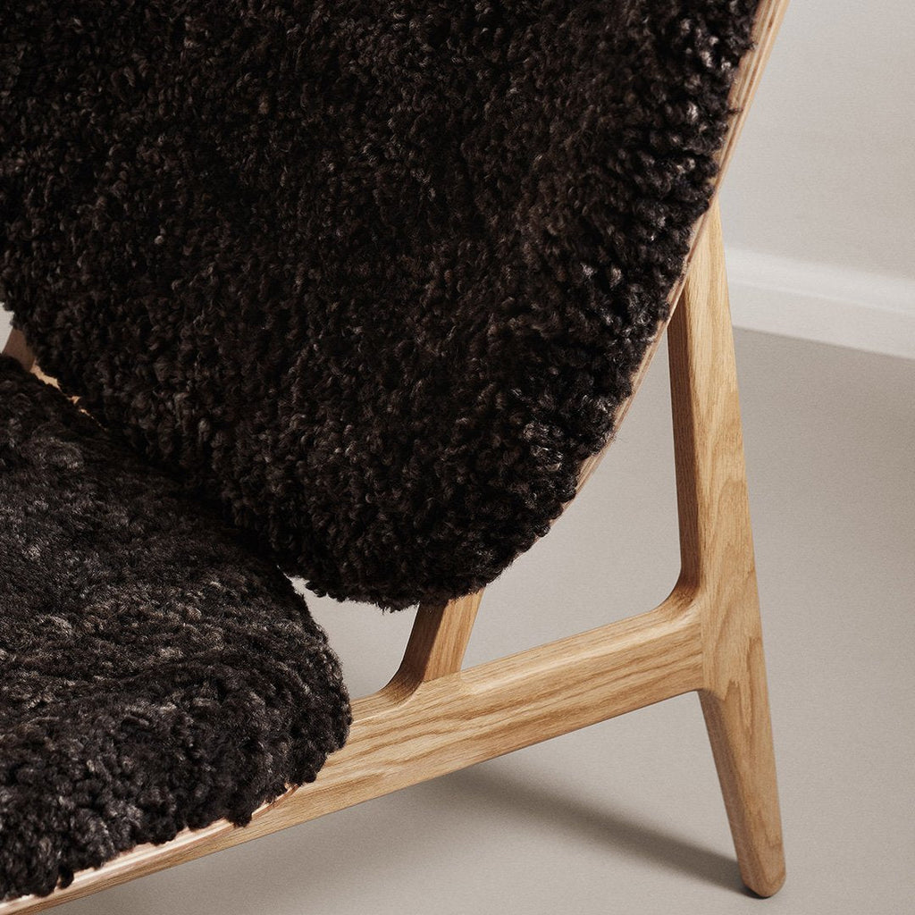 Fauteuil de salon scandinave en chêne massif avec dossier incurvé en forme d'oreille d'éléphant pour salon