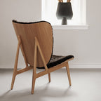 Fauteuil de salon scandinave en chêne massif avec dossier incurvé en forme d'oreille d'éléphant pour salon