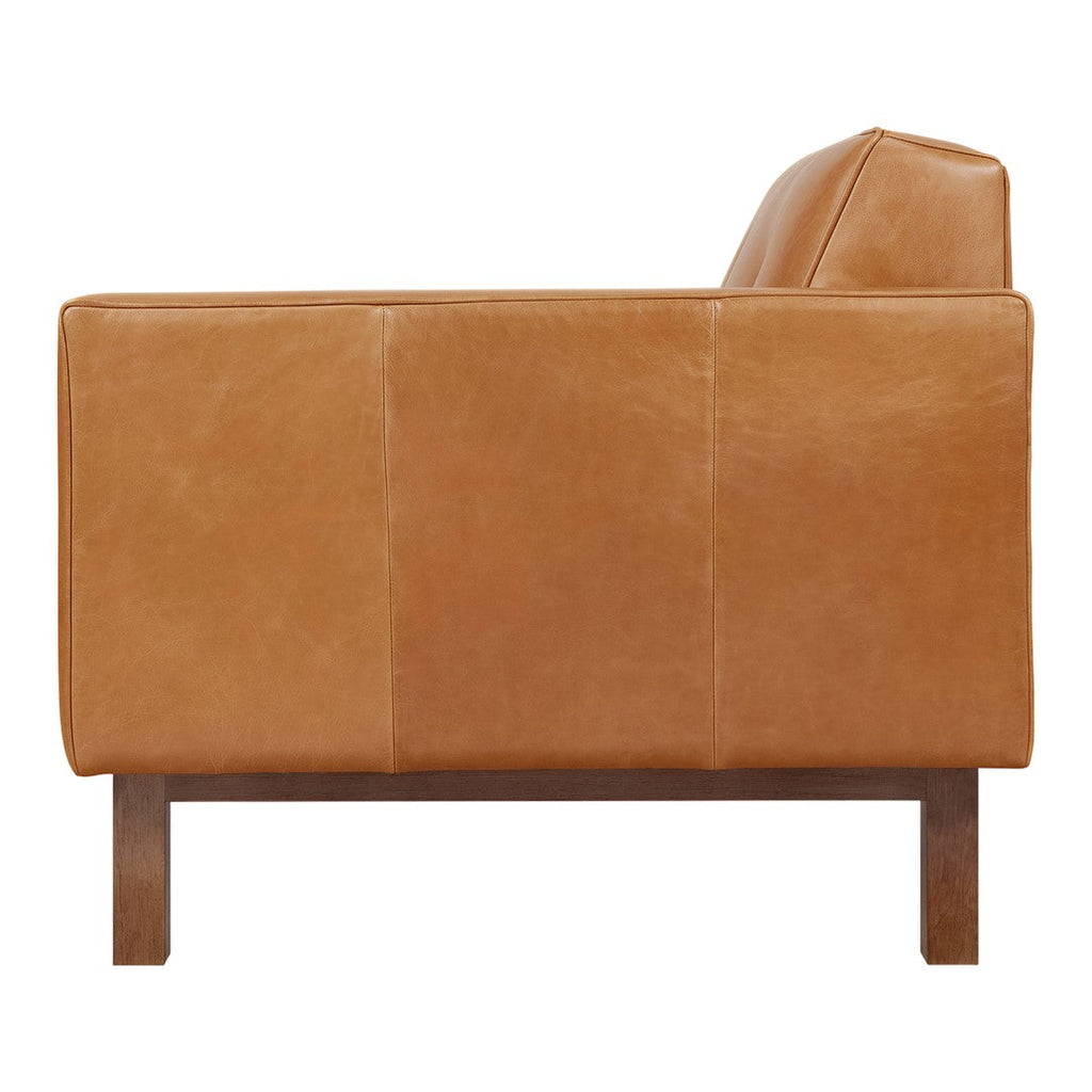 Fauteuil de salon vintage en cuir du milieu du siècle avec assise capitonnée garnie de plumes pour le salon