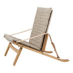 Fauteuil de salon scandinave en chêne massif et toile de lin avec dossier pliable et ferrures en laiton pour salon