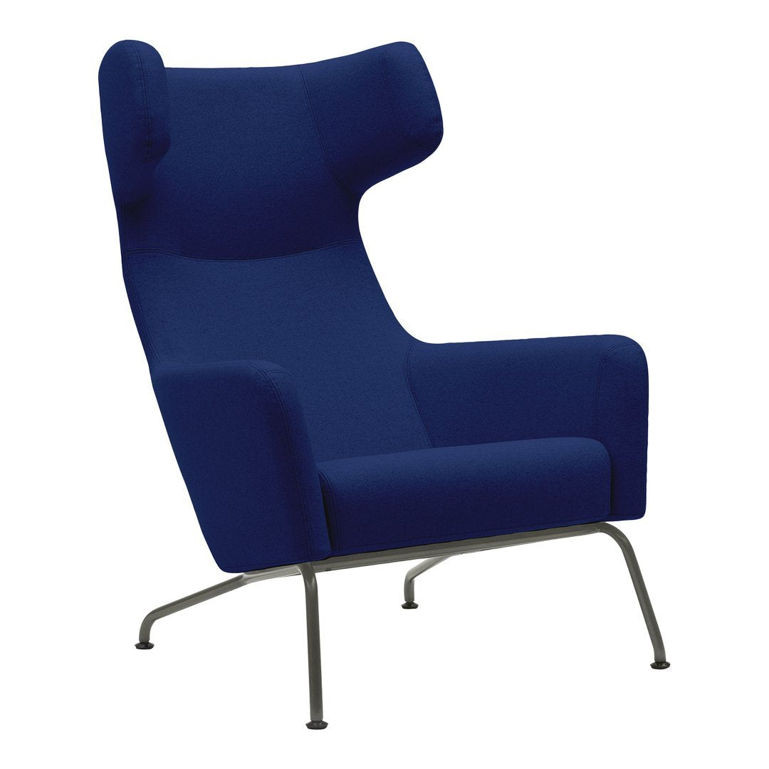 Fauteuil lounge ailé moderne rembourré avec silhouette dynamique arrondie pour salon