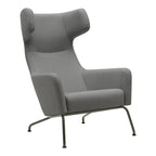 Fauteuil lounge ailé moderne rembourré avec silhouette dynamique arrondie pour salon