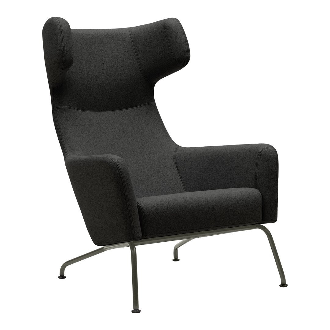 Fauteuil lounge ailé moderne rembourré avec silhouette dynamique arrondie pour salon