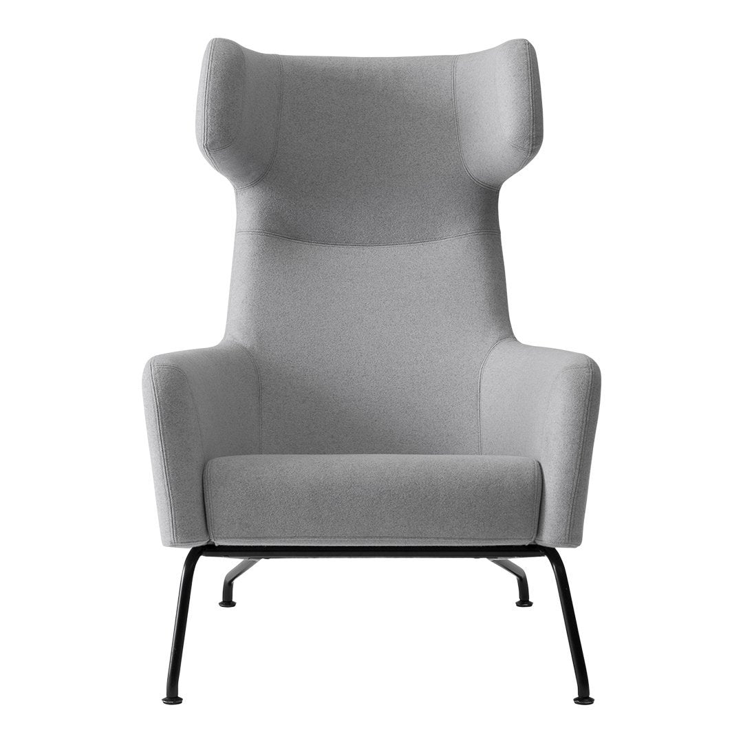 Fauteuil lounge ailé moderne rembourré avec silhouette dynamique arrondie pour salon