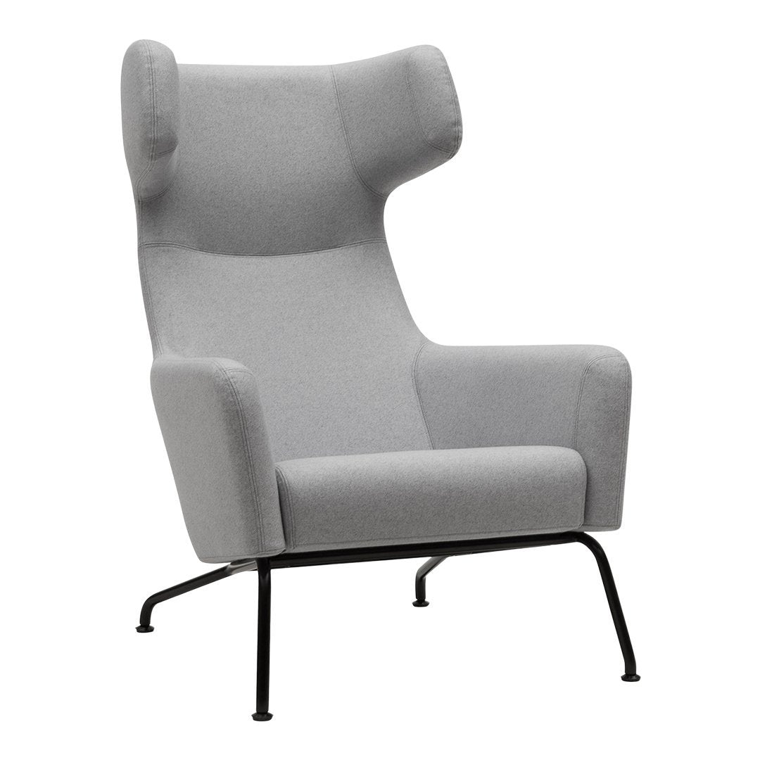 Fauteuil lounge ailé moderne rembourré avec silhouette dynamique arrondie pour salon