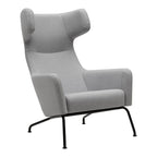 Fauteuil lounge ailé moderne rembourré avec silhouette dynamique arrondie pour salon