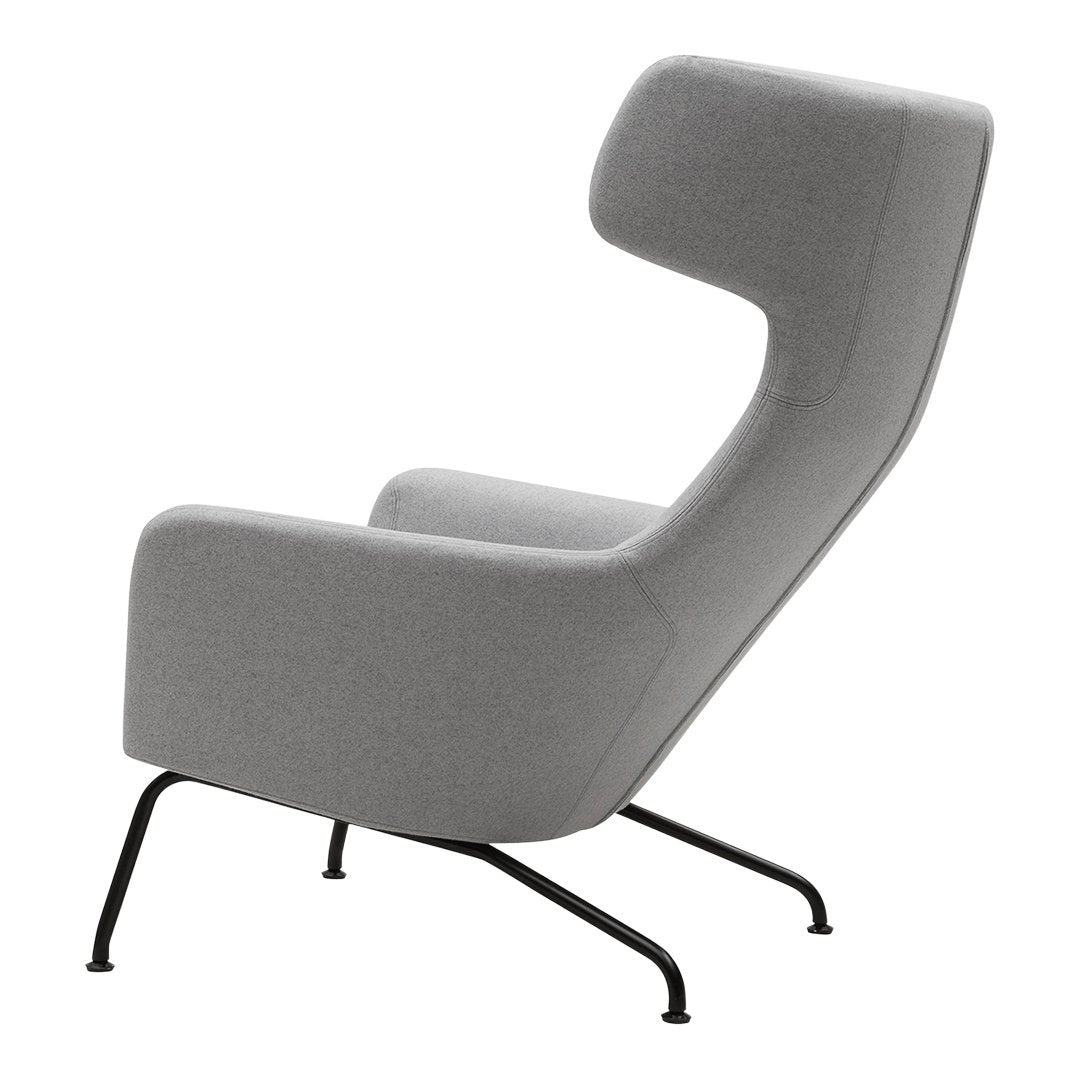 Fauteuil lounge ailé moderne rembourré avec silhouette dynamique arrondie pour salon