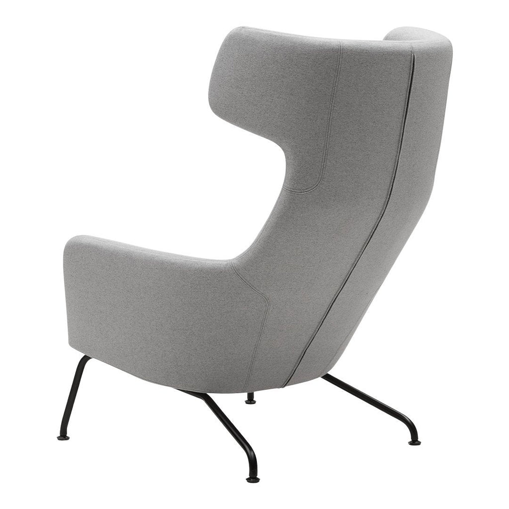 Fauteuil lounge ailé moderne rembourré avec silhouette dynamique arrondie pour salon
