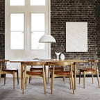 Chaise d'appoint empilable en bois massif scandinave au design minimaliste intemporel pour salle à manger