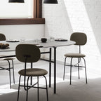 Chaise de salle à manger Bauhaus minimaliste entièrement tapissée avec structure en acier aux lignes épurées