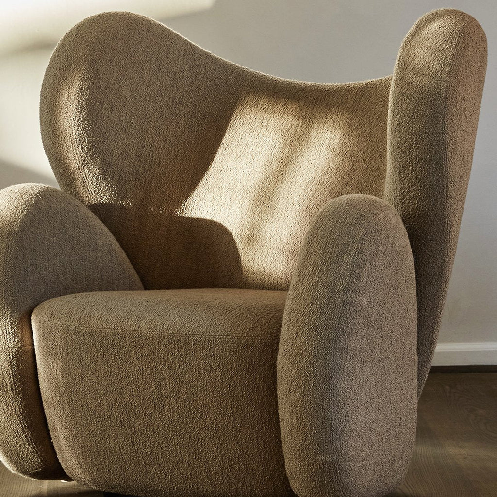 Fauteuil de salon pivotant entièrement rembourré Art Déco avec structure bloc volumineuse pour salon