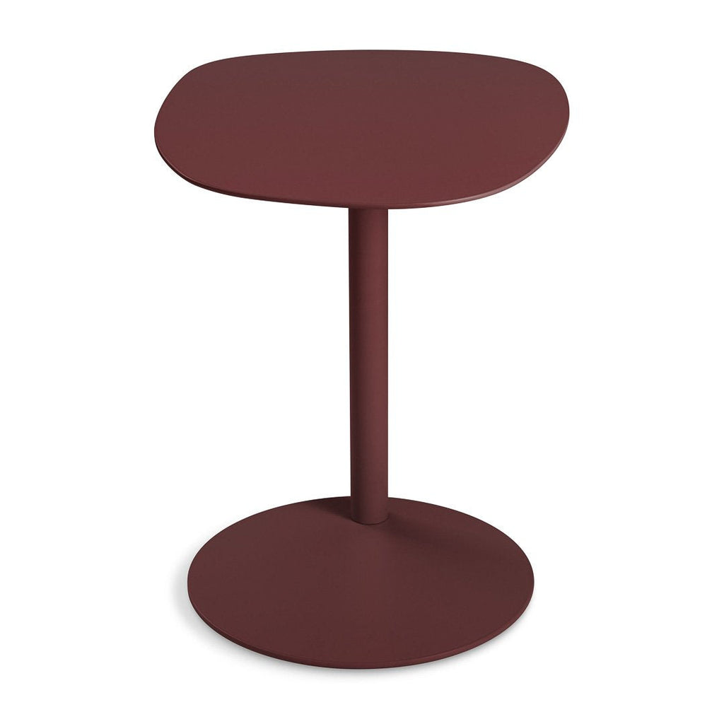 Table d'appoint contemporaine avec base en marbre et structure en acier, forme sculpturale inspirée d'une sucette, pour salon ou chambre à coucher