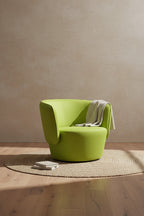 Fauteuil de salon moderne entièrement rembourré avec accoudoir intégré et assise ovale pour salon