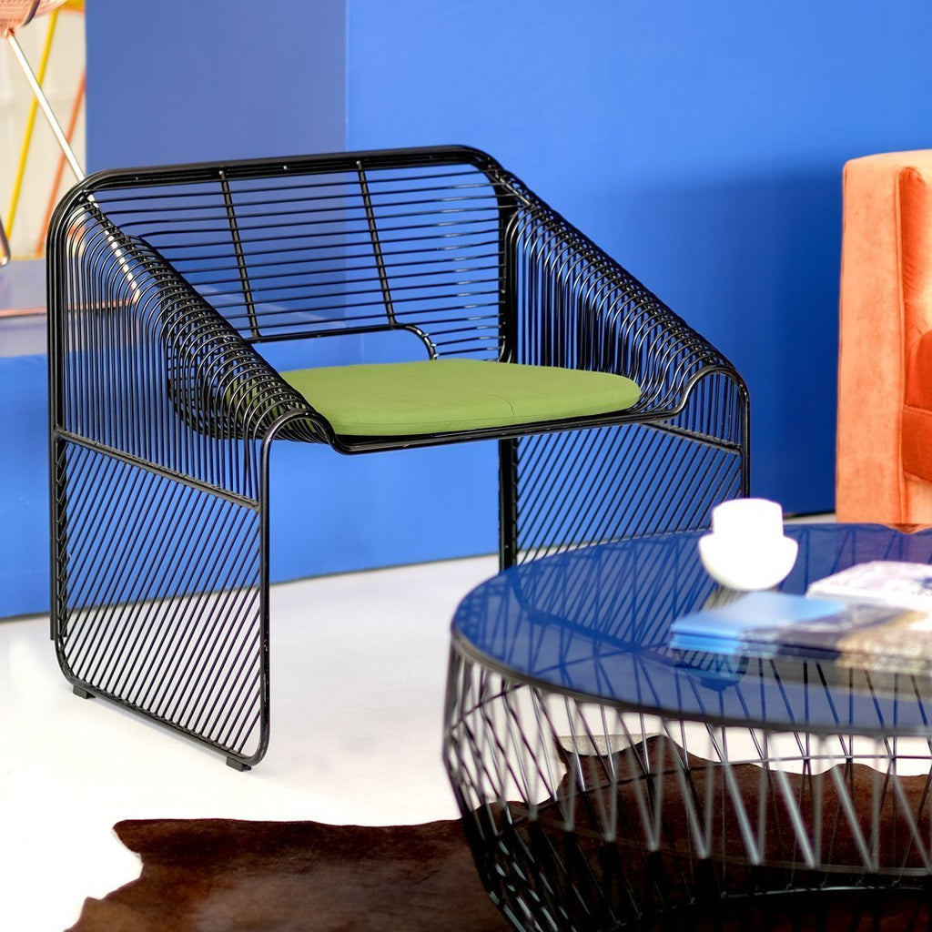 Fauteuil lounge moderne capitonné avec forme contemporaine confortable pour salon